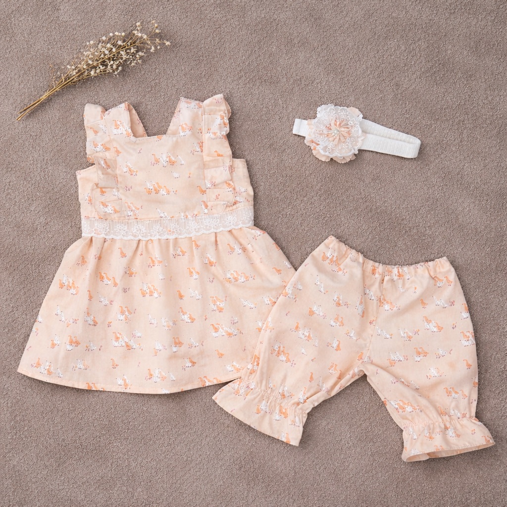 Handmade peach floral dress, bloomers, and matching headband.