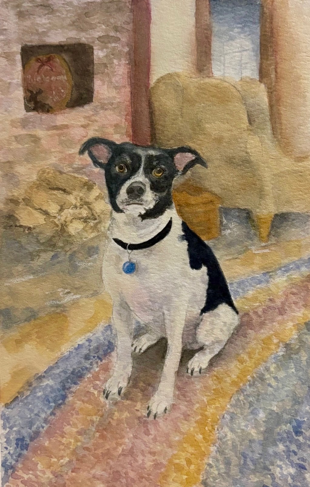 Watercolor portrait of a man in a blue shirt sitting with a dog.
