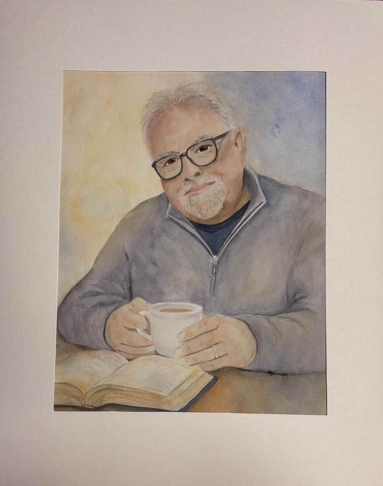 Watercolor portrait of an older man seated with a cup and an open book.